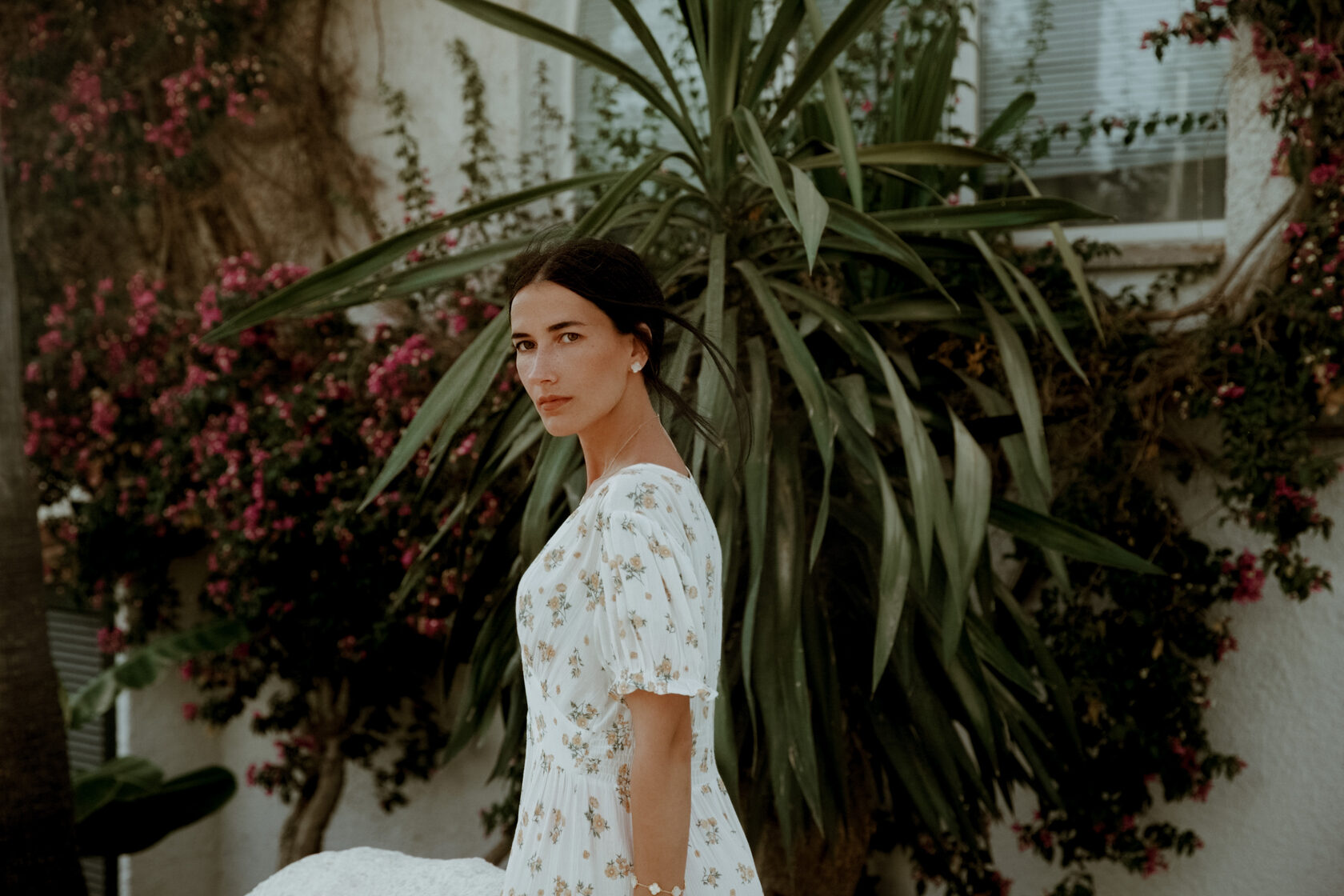 Natural editorial portrait among tropical plants